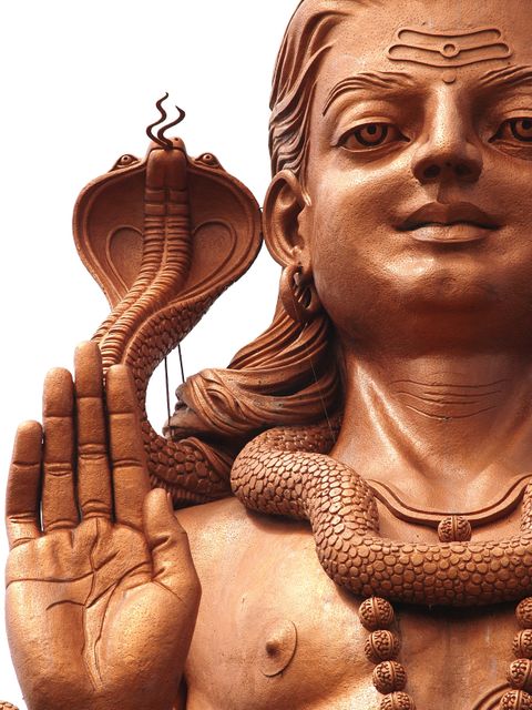 Close-Up of Ancient Indian Shiva Statue with Serpents - Download Free Stock Photos Pikwizard.com