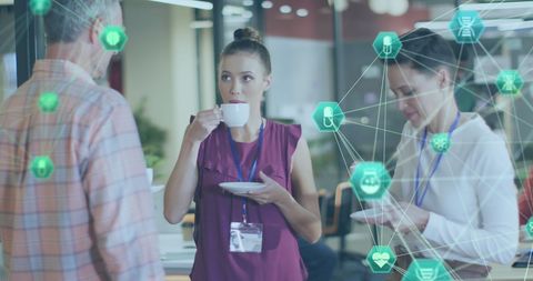 Diverse Colleagues Discussing Innovation with Digital Interface