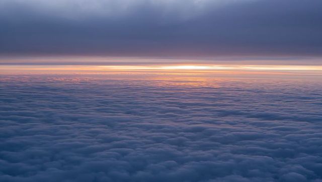 Serene Cloudscape: Stratocumulus Layers at Sunrise