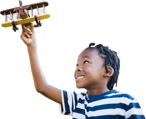joyful boy holding wooden toy airplane on transparent background - Download Free Stock Videos Pikwizard.com