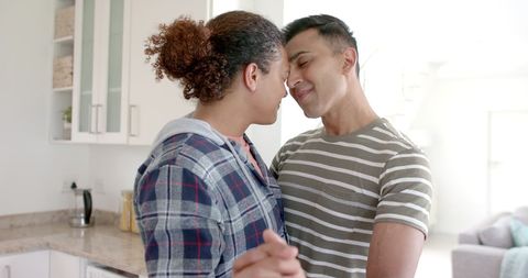 Romantic Gay Couple Dancing in Home Kitchen Embrace - Download Free Stock Images Pikwizard.com