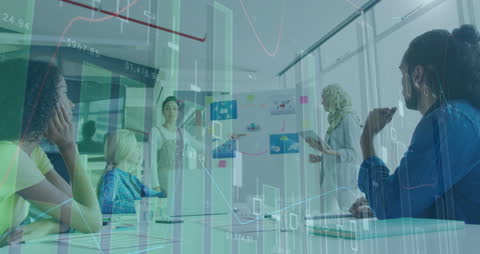 Diverse Team Discussing Strategies Over Financial Data Visuals