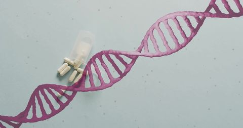 Dna strand overlaying medication on abstract background