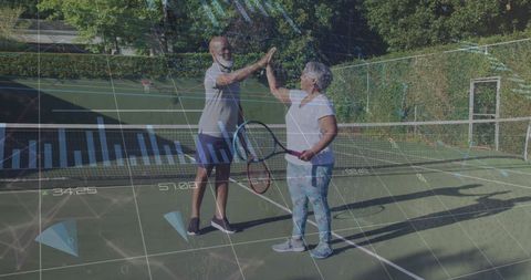 Senior Couple Celebrating Tennis with Data Overlay