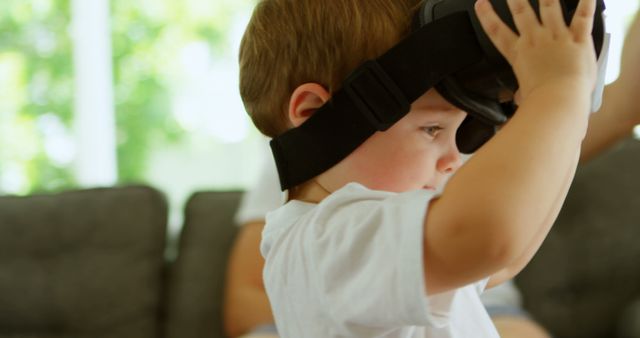 Young Child Exploring Virtual Reality Indoors - Download Free Stock Images Pikwizard.com
