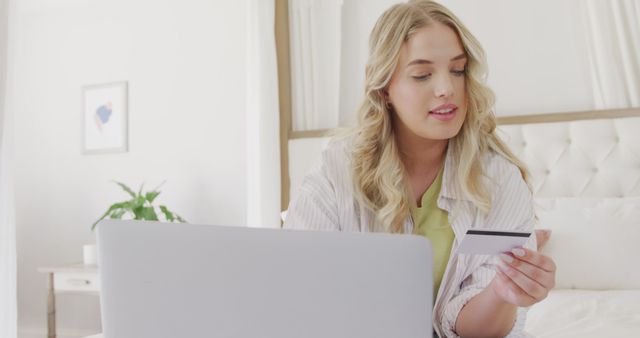 Young Woman Shopping Online with Laptop and Credit Card at Home - Download Free Stock Images Pikwizard.com