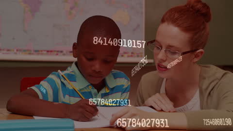 Teacher Guiding Child on Math Lesson in Classroom