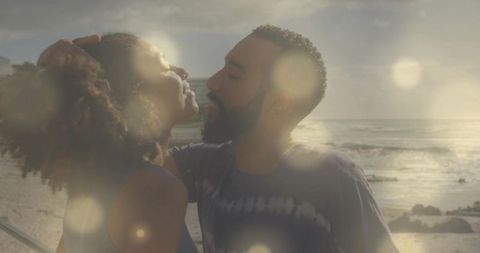 Romantic Couple Embracing at Seaside During Golden Sunset