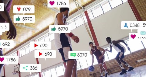 basketball players are on an indoor court surrounded by social media interaction icons such as likes, comments, and viewers. this represents the influence of digital communication and social media on modern sports. suitable for articles on the integration of technology in sports, the role of social media in athletes’ lives, or the digital influence on sporting events.