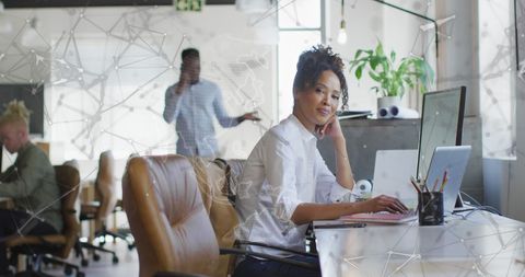 Digital Interface in Modern Office with Smiling Businesswoman - Download Free Stock Images Pikwizard.com