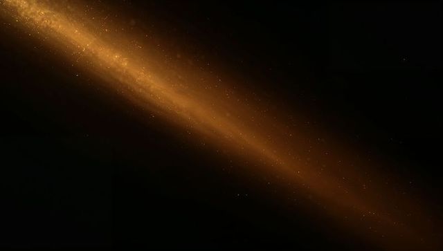 Golden cosmic ribbon sweeping through deep space with scattered stars and amber halo