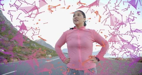 Woman in Pink Athleisure on Scenic Road with Digital Overlay