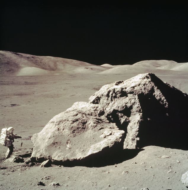 In this Apollo 17 onboard photo, Lunar Module pilot Harrison H. Schmitt collects rock samples from a huge boulder near the Valley of Tourus-Littrow on the lunar surface. The seventh and last manned lunar landing and return to Earth mission, the Apollo 17, carrying a crew of three astronauts: Schmitt; Mission Commander Eugene A. Cernan; and Command Module pilot Ronald E. Evans, lifted off on December 7, 1972 from the Kennedy Space Flight Center (KSC). Scientific objectives of the Apollo 17 mission included geological surveying and sampling of materials and surface features in a preselected area of the Taurus-Littrow region, deploying and activating surface experiments, and conducting in-flight experiments and photographic tasks during lunar orbit and transearth coast (TEC). These objectives included: Deployed experiments such as the Apollo lunar surface experiment package (ALSEP) with a Heat Flow experiment, Lunar seismic profiling (LSP), Lunar surface gravimeter (LSG), Lunar atmospheric composition experiment (LACE) and Lunar ejecta and meteorites (LEAM). The mission also included Lunar Sampling and Lunar orbital experiments. Biomedical experiments included the Biostack II Experiment and the BIOCORE experiment. The mission marked the longest Apollo mission, 504 hours, and the longest lunar surface stay time, 75 hours, which allowed the astronauts to conduct an extensive geological investigation. They collected 257 pounds (117 kilograms) of lunar samples with the use of the Marshall Space Flight Center designed Lunar Roving Vehicle (LRV). The mission ended on December 19, 1972
