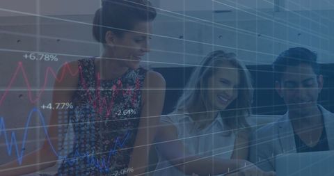 Team Collaborating on Financial Data Analysis with Laptops