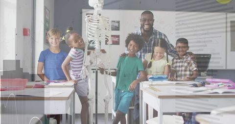 Interactive classroom anatomy lesson with teacher guiding students around skeleton model