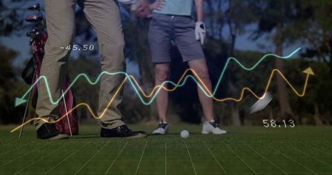 Golf Partners Analyzing Shot Metrics on Putting Green