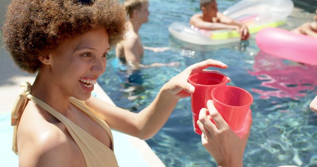 Friends Enjoying Refreshing Drinks at Pool Party - Download Free Stock Images Pikwizard.com