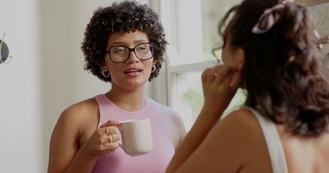 Friends Sharing Coffee and Conversation at Home