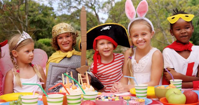 Diverse Children Celebrating in Fun Costumes at Outdoor Party - Download Free Stock Images Pikwizard.com