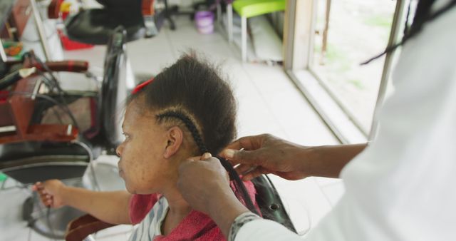 Hair Stylist Creating Cornrow Braid on female Client in Hair Salon - Download Free Stock Images Pikwizard.com