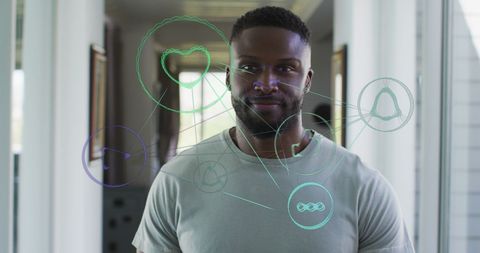 Futuristic technology overlay on smiling man