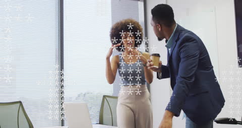 Multiracial Coworkers Exploring Technological Solutions in Office Environment