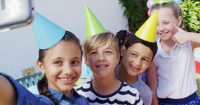 Joyful Children Taking Selfie at Outdoor Birthday Party - Download Free Stock Images Pikwizard.com