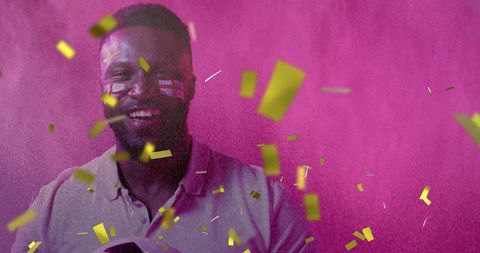 Joyful Soccer Fan Celebrating with England Face Paint and Confetti