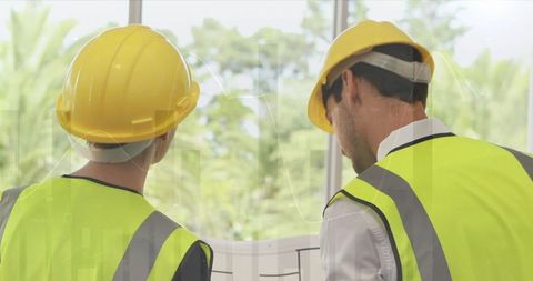Architects Analyzing Blueprints at Construction Project with Data Overlay - Download Free Stock Images Pikwizard.com