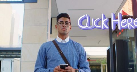 Young Professional Holding Smartphone City Background