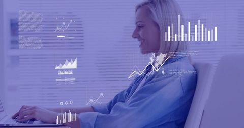 Businesswoman Analyzing Financial Data on Laptop with Graph Overlays