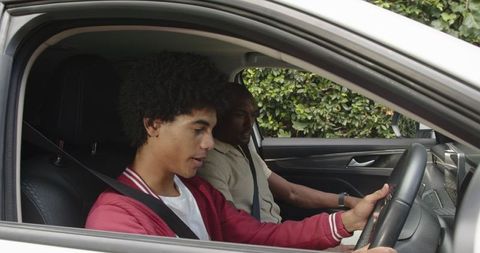 Father and Son Bonding During Neighborhood Drive