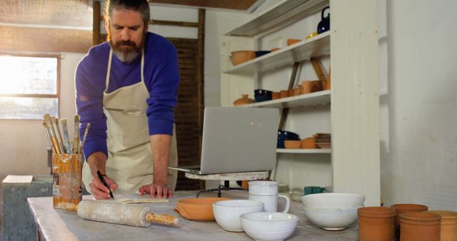 Male Potter Working with Clay Objects in Studio - Download Free Stock Images Pikwizard.com