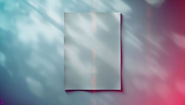 Blank white paper illuminated with gradient lighting