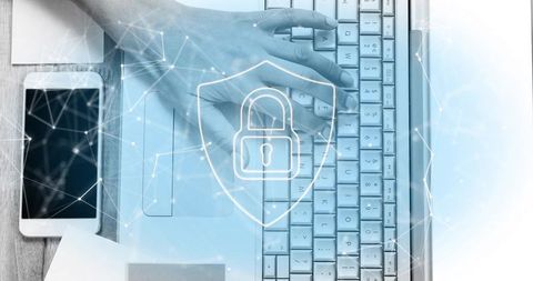 Right Hand Typing on Laptop Keyboard with Digital Shield and Padlock Overlay