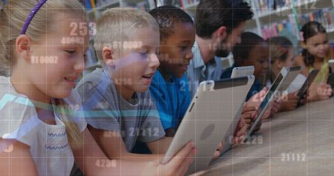 Diverse Students and Teacher Using Tablets in Classroom with Data Overlay - Download Free Stock Images Pikwizard.com