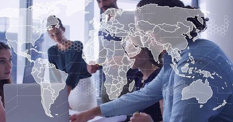 Collaborating global team analyzing data on laptop with digital world map overlay