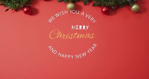 Festive holiday greeting with evergreen garland and ornaments