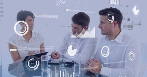 Business Team Discussing Financial Data Visualization in Office