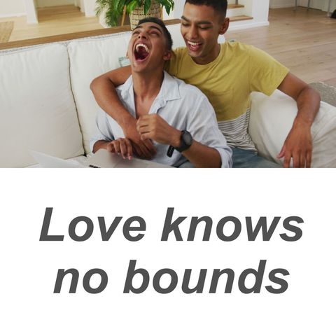 Happy lgbtq+ couple sharing joyful moment on couch
