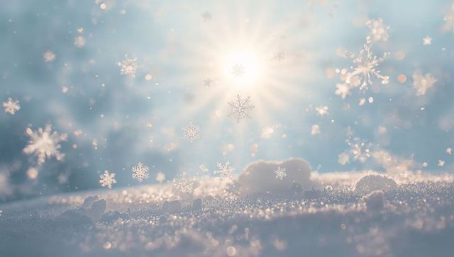 Sunlit glittering snowflakes falling over frosty ground close-up winter sparkle background