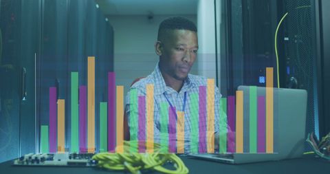 Data analyst in server room with digital graph overlay