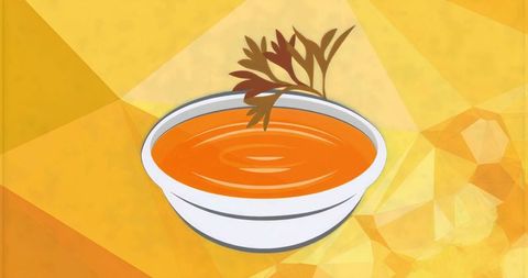 Creamy Tomato Soup Sitting in White Bowl with Herb Garnish on Warm Geometric Background