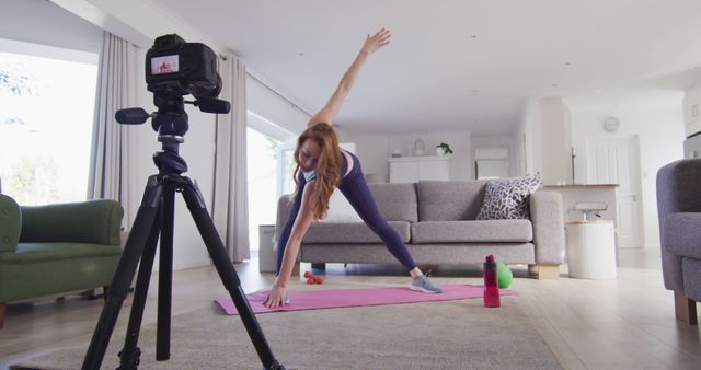 Woman Filming Workout Routine at Home for Online Fitness Vlog - Download Free Stock Images Pikwizard.com