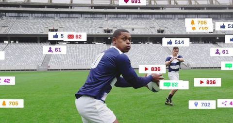 Rugby Players Analyzing Social Media Data on Stadium Field