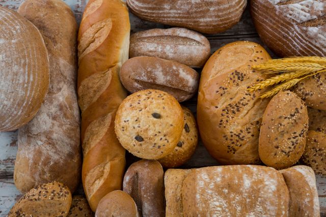 Different types of bread with wheat grains
