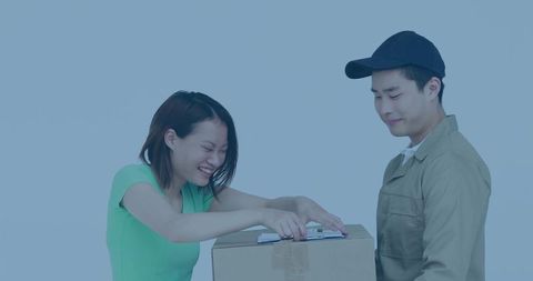 Courier Hands Package to Smiling Recipient in Studio