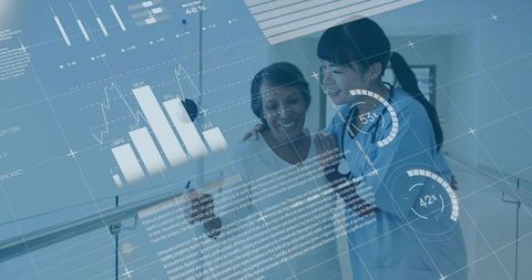 Healthcare professional discussing digital data with patient in hospital room