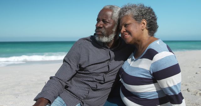 Senior Couple Relaxing on Beachside on a Sunny Day - Download Free Stock Images Pikwizard.com