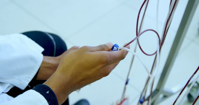 Nurse Adjusting Dialysis Equipment in Hospital - Download Free Stock Images Pikwizard.com